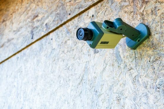 Fake Security Camera Placed On A Wooden Osb (oriented Strand Boa Fake Security Camera Placed On A Wooden Osb (oriented Strand Boa