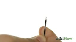 hand holding a bobby pin