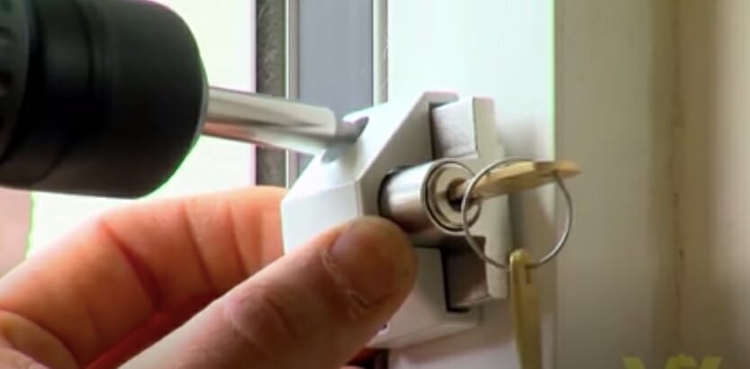 position the lock on the door frame