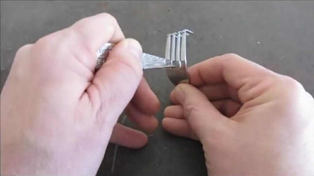 slide the handle into gap